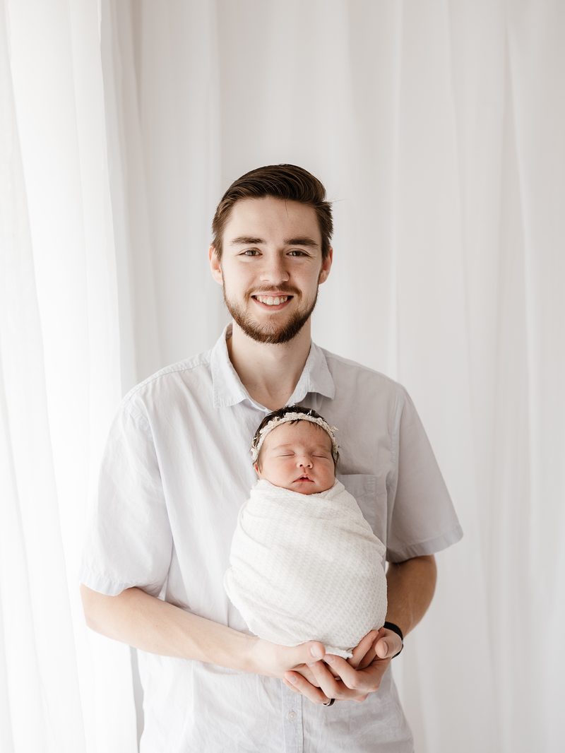 Logan with his newborn