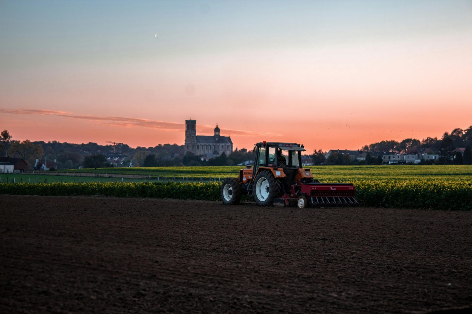 Family farm at sunset